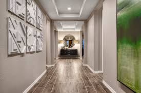 Wood Look Tile Flooring Harley Model Home Entry Glendale Arizona Richmond American In 2020 Richmond American Homes Wood Look Tile Wood Look Tile Floor