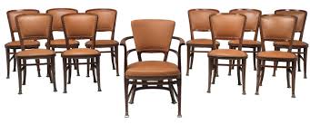 Made By Portois Fix First Quarter Of The 20th Century Brown Stained Hardwood Frames With Lateral Stretchers And Brass Feet