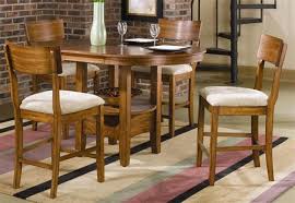 It's extremely rare to find a 5 piece retro dining set with. Storage Counter Height 5 Piece Dining Set With Round Oval Table Top In Oak Finish By Coaster 101008