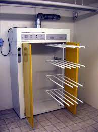 A typical residential drying cabinet is approximately the size of a narrow refrigerator, and is used to. Drying Cabinet Wikipedia
