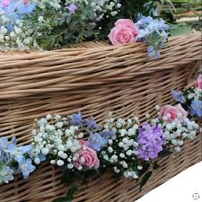 We specialise in eco friendly wicker coffins and other material woven coffins suitable for burial or cremation. Casket Garlands Buy Online Or Call 01634 716154