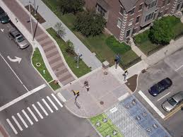 The Design Team Bumped Out The Curbs To Reduce Crossing Distances And Used Special Pavement Markings Urban Landscape Design Streetscape Design Pavement Design