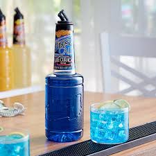 There are no legal differences between triple sec and curacao, only a few practical and many historical differences. Finest Call 1 Liter Premium Blue Curacao Syrup
