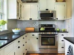 Small L Shaped Kitchen Design Ideas With White Kitchen Cabinet And Black Granite Countertop L Shaped Kitchen L Shaped Kitchen Designs Small L Shaped Kitchens