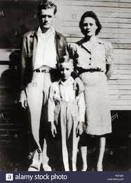 His father, vernon presley, talked about elvis's close relationship to his mother after his son became famous, almost as if it were a source of wonder that anyone couldn't be that close to him. during presley's rising career, gladys became despairing, depressed and lonely and began to neglect her health. Elvis Presley With Parents Vernon And Gladys Outside Their Tupelo House About 1942 Stock Photo Alamy