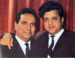 Last Song Composed By Shankarji he died while composing Music & later this  song was Recorded by Enoch Daniels .Listen to it no current Music Director  can create music of this Caliber.