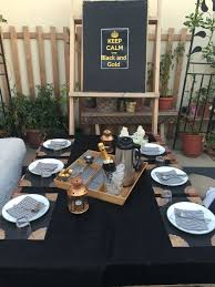 Black And Gold Table Simple Black Gold Table Setting For Mr Ragu S Farewell Gold Table Setting Gold Table Table Settings