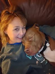 Cute puppy cuddling and being little