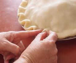 Crimp Or Flute A Pie Crust To Seal It How To Video Finecooking Pie Crust Homemade Pie Crusts Homemade Pie Crust Recipe