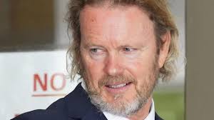 Prosecutors withdraw two charges against actor craig mclachlan, as a contested hearing on alleged indecent assault and assault charges continues in the melbourne magistrates' court. Actor Craig Mclachlan Faces Wait Sex Case On Hold