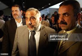 Outgoing Industry Minister Hajem Al-Hassani, a Sunni Muslim who is a...  News Photo