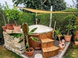 Badefass Gfk Mit Whirlpool Holz Befeuert Fur Draussen Kaufen In 2020 Badefass Whirlpool Sonnenschutz Garten