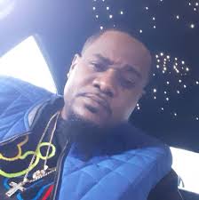 Which building is closer to you if you took this picture??