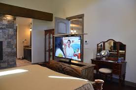 Having a tv in the bedroom is nice, but when the tv becomes the focal point of the room it can take away from the rest of the decor. Custom Pop Up Tv Cabinet Rustikal Schlafzimmer Sonstige Von Audio Video Solutions Inc Houzz