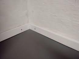 Stairs floor edging upvc stair nosing stairs edge laminate flooring modern room vinyl flooring floor trim. Can I Trim The Plastic Sticking Up From Edges Of My Basement Wall Home Improvement Stack Exchange