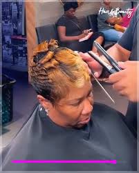 Who can do natural hair and weaves in Garfield, Shaker, Warrensville, or  Maple area?