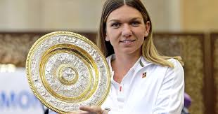 Cu cine a stat în lojă. 10 Questions About Simona Halep Ion Tiriac Coach Federer Fan