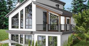 Narrow house plans provide creative designs to maximize space without compromising functionality or versatility. Plan 22522dr Modern Vacation Home Plan For The Sloping Lot In 2021 Modern Style House Plans Drummond House Plans Small Lake Houses