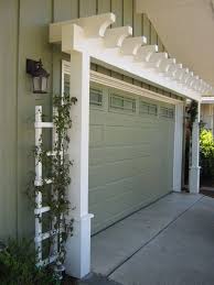 Pin By Deb Stahl On Curb Appeal House Exterior Garage Pergola Door Arbor