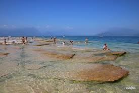 Maybe you would like to learn more about one of these? Lake Garda In Summer Travagsta