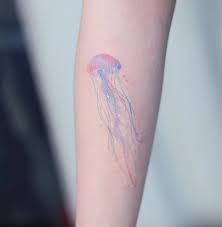 The whimsical and magical watercolor style really fits the jellyfish and adds to the mysterious meaning of the jellyfish tattoo. Minimalist Watercolor Jellyfish Tattoo See More Ideas About Tattoos Minimalist Tattoo Small Tattoos Jantonio Ferreira