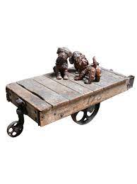 Old wooden cart wheel exhibited as antique. Antique Vintage Cart 1920 With Cast Iron Wheels