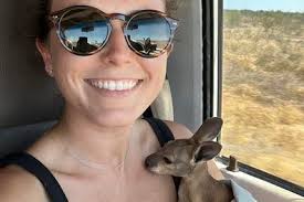 Couple rescue orphaned baby kangaroo in outback Australia