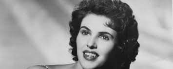 On This Day in 1975, Ronnie Milsap Was at No. 1 With a Song Inspired by  Olivia Newton-John