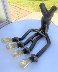 Nice Old Suzuki Crotch Rocket Exhaust Header Up Cycled To Awesome Light Fixture Industrial Style Lighting Inspiration Light Fixtures