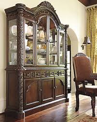 Transform your dining area with the rich style of the north shore dining room collection. North Shore Dining Table And 8 Chairs With Storage Set Ashley Furniture Homestore