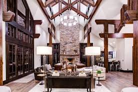 With its rattan chandeliers, driftwood framing and large potted ferns, how could you not feel away on vacation? 35 Best Rustic Living Room Ideas Rustic Decor For Living Rooms