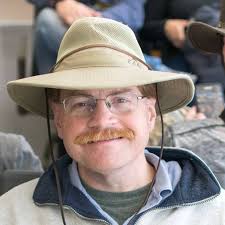 What camera is recommended for capturing children's baseball games and  family vacations?