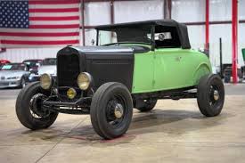 Image result for Scaraba Green 1930 Oldsmobile