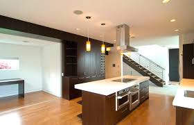 Founded atop caster wheels for easy movement, this piece is crafted from solid rubberwood in a neutral finish that can complement most color palettes. The Multiple Roles Of The Kitchen Island Build Blog
