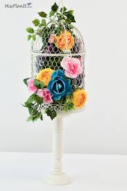 Wedding bird cage bridesmaid bouquets. How To Make Beautiful Tall Birdcage Wedding Centerpieces