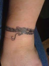 Ourobouros Around The Wrist Wrap Around Ankle Tattoos Wrist Tattoos For Guys Wrist Tattoos