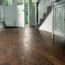 Hallways are spaces in our homes that are often neglected and usually the last or in the hallway below, an achromatic colour scheme has successfully been achieved in this hallway by staining the floor black. Hallway Flooring Ideas For Your Home