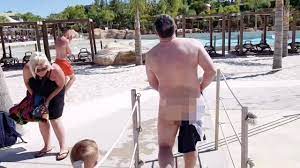 Hilarious moment dad's swimming trunks DISSOLVE forcing him to walk naked  through water park after son-in-law's prank – The Sun | The Sun