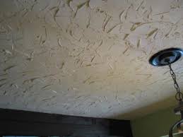 Depending on the paint you choose, you can add a unique texture, hide cracks in your plaster or add a glossy sheen. How To Cover A Popcorn Ceiling With Plaster Covering Popcorn Ceiling Popcorn Ceiling Wallpaper Ceiling