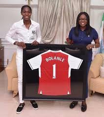 Her exceptional success earned her a place in the. Arsenal Ladies Striker Asisat Oshoala Presents Her Adopted Mother Lagos State First Lady Bolanle Ambode With A Framed Customized Jersey