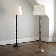 A floor lamp can also provide extra mood lighting where you need it most. Sloan Wood Ball Floor Lamp Ballard Designs Floor Lamp Floor Lamps Living Room Traditional Floor Lamps