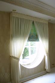 Another Beautiful Porthole Window Fitted With A Functional Interlined Handsewn Roman Blind And Sheer Curtains To The Curtains Porthole Window Sheer Curtains