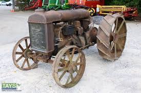 Two antique 34 rear hay wagon steel wheels and one 30 front wheel, asking $120. Tays Realty Auction Auction Absolute Bankruptcy Online Auction Tractors Vehicles Implements Tools Antique Tractors Hit Miss Engines Item Fordson Model F Steel Wheel Tractor