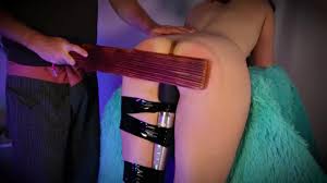 With a Doxy wand strapped to their leg, Brodie is spanked with a paddle and  made to cum (Preview)