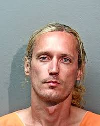 Dangerous Robbery Suspect Arrested* On May 5 shortly after 5 a.m., a female  was in her car in the drive-thru of the McDonald's restaurant located at  700 E. Berry St. A white