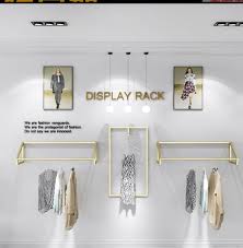 This garment rack also includes two sturdy, 1 thick shelves that provide a space to store your collection of shoes, scarves, and gloves, and organizing bins. Gold Clothing Store Display Rack Wall Hanging Women S Clothing Store Decoration Clothes Rack Hanging Rod Children S Clothing Storage Holders Racks Aliexpress