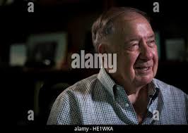 Retired U.S. Air Force Gen. Norton A. Schwartz, center, President and Chief  Executive Officer of Business Executives for National Security (BENS);  recognizes U.S. Air Force Col. Julian Cheater, left, Commander of the