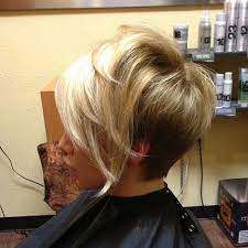 You can create an asymmetrical element to your hairstyle by using a diagonal. Asymmetrical Haircut Stacked Wedge In The Back Hair Styles Short Hair Styles Stacked Hairstyles