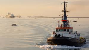 It's 120 miles long, 79 feet deep and 673 feet wide. Suez Canal Transit