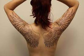 Tatouage bel oiseau paon moitie du dos femme cote pin tatouage aile d ange omoplate pinterest picture. Epingle Sur Tattoo